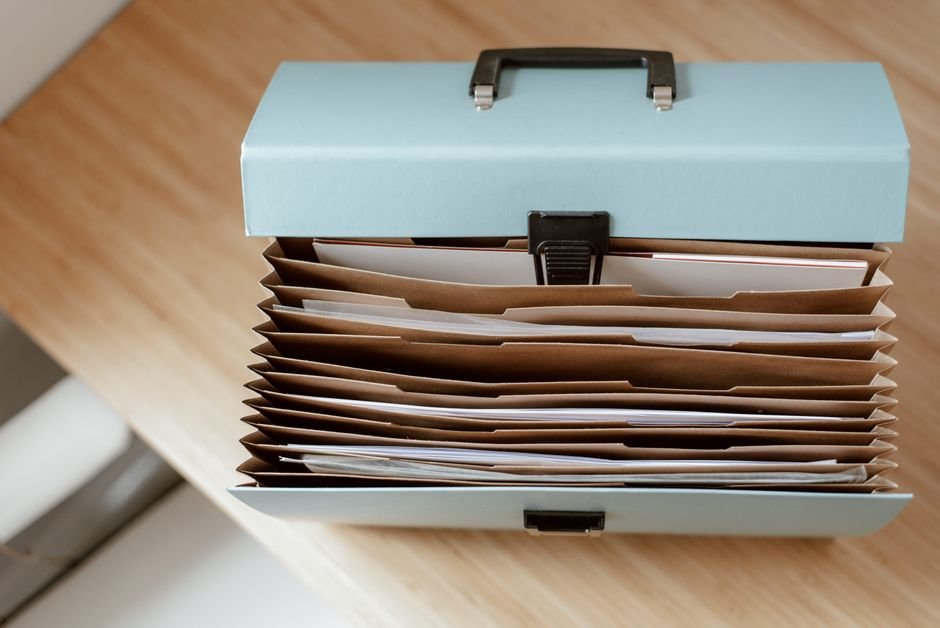 Organized documents and folders on a desk
