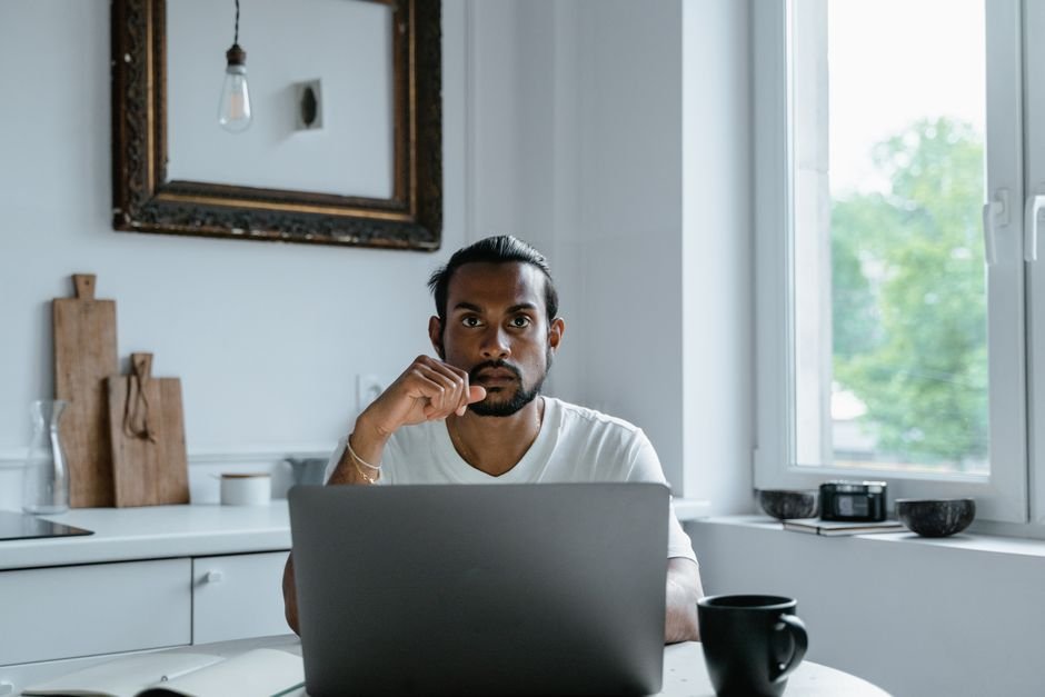 Person working quietly at a home desk